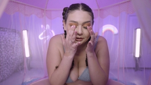 Inserted: Brunette teasing natural boobs